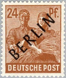 Colnect-584-388-Bricklayer-and-farmer-lady.jpg
