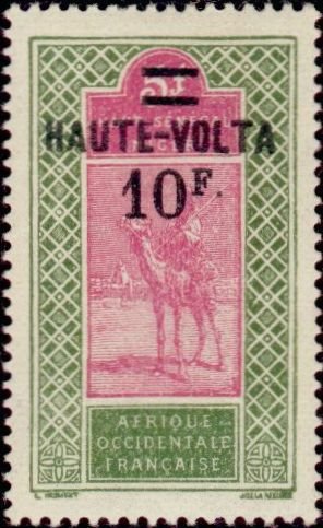 Colnect-812-832-Dromedary-Camelus-dromedarius-with-Rider.jpg