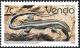 Colnect-2840-113-Blue-tailed-Skink-Mabuya-quinquetaeniata-margaritifer.jpg