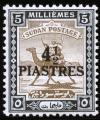 Colnect-1241-559-Postman-with-Dromedary-Camelus-dromedarius.jpg