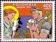 Colnect-3499-653-Woman-reading-letter-mailman-holding-bundle-of-mail.jpg