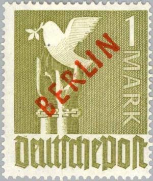 Colnect-154-741-Peace-dove-over-unfettered-hands.jpg