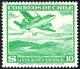 Colnect-2727-004-Plane-over-mountain-lake.jpg