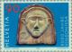 Colnect-140-893-Gallic-head-with-the-mark-of-the-XI-Legion-antefix.jpg