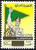 Colnect-1954-978-General-Kassem-in-front-of-flag.jpg