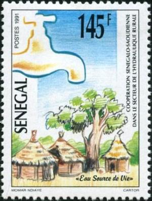 Colnect-2133-381-Village-and-Water-Tap.jpg