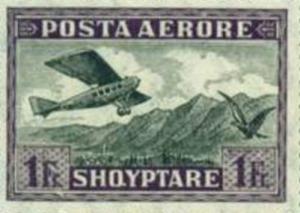 Colnect-1494-425-Airplane-crossing-Mountains.jpg