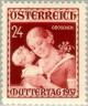 Colnect-135-967-Child-congratulates-his-mother.jpg