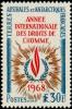 Colnect-885-973-UN-emblem-of-human-rights-in-corona.jpg
