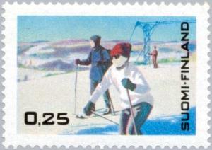 Colnect-159-508-Skiing-tourists-and-chair-lift.jpg
