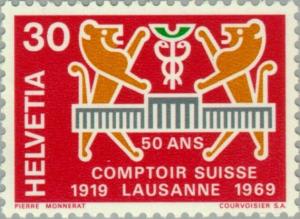 Colnect-140-366-Two-lions--amp--Comptoir-badge.jpg