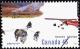 Colnect-593-395-Sled-Dogs-Canis-lupus-familiaris-Ski-Plane.jpg