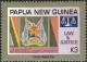 Colnect-5974-023-Saluting-policemen-arms--amp--scales-of-justice-Tenison-Paki.jpg