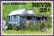 Colnect-5145-572-Twin-roofed-house-with-veranda-Barnes-Ghaut-Village.jpg