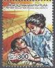 Colnect-3601-808-Woman-with-child.jpg