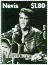 Colnect-5206-386-Elvis-wearing-black-leather-facing-forward.jpg