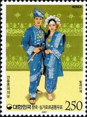 Colnect-1604-744-Traditional-Wedding-Costumes---Malay-wedding-costumes.jpg