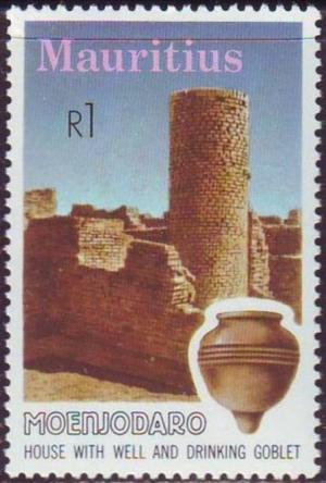 Colnect-3555-204-House-with-well-and-goblet.jpg